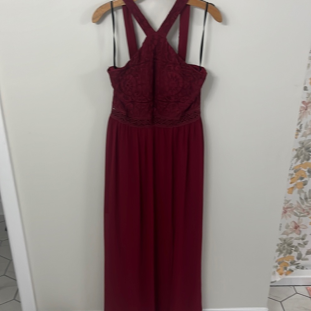 Long sheer crimson dress.